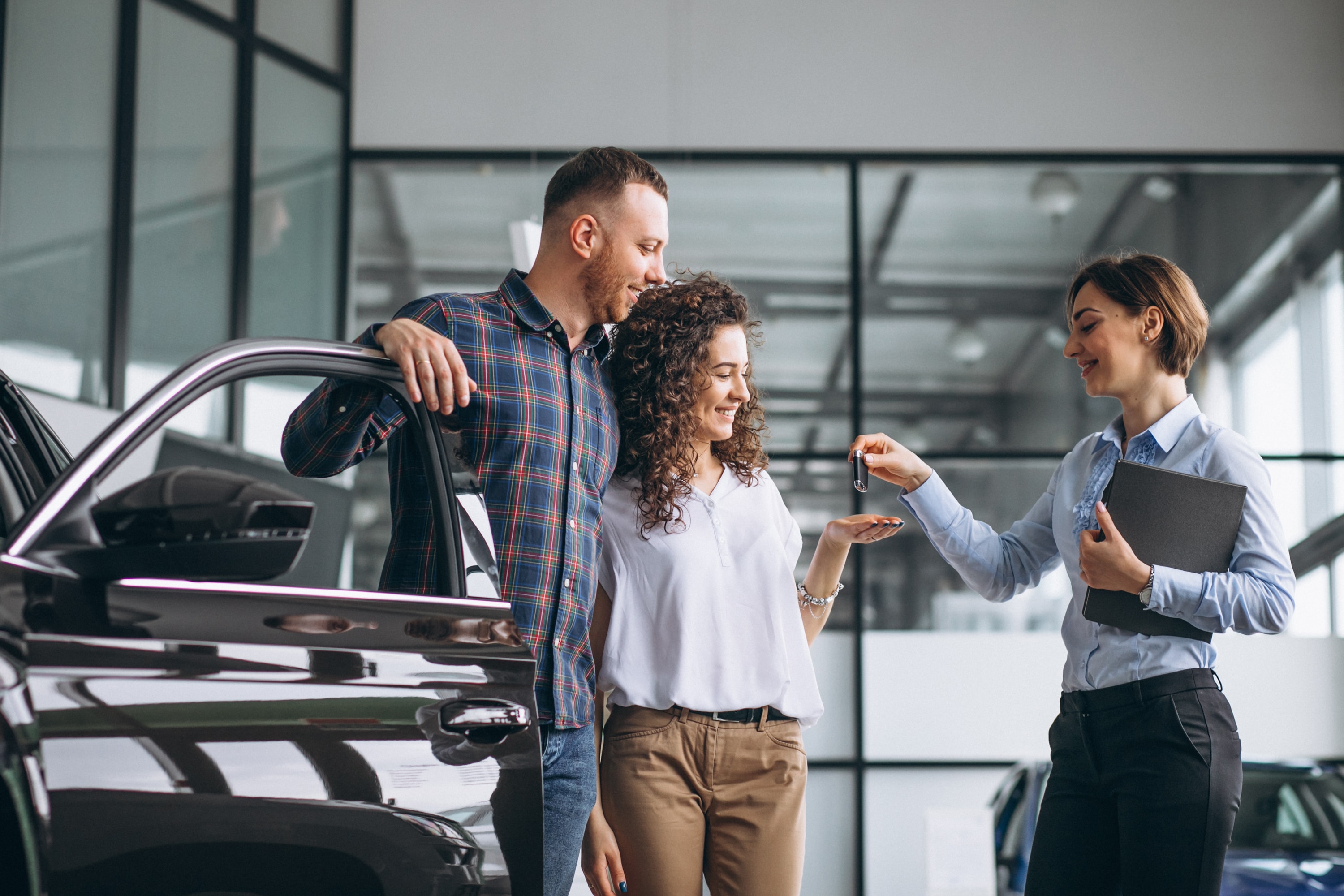 Young couple choosing a car at Diamond II Auto Sales